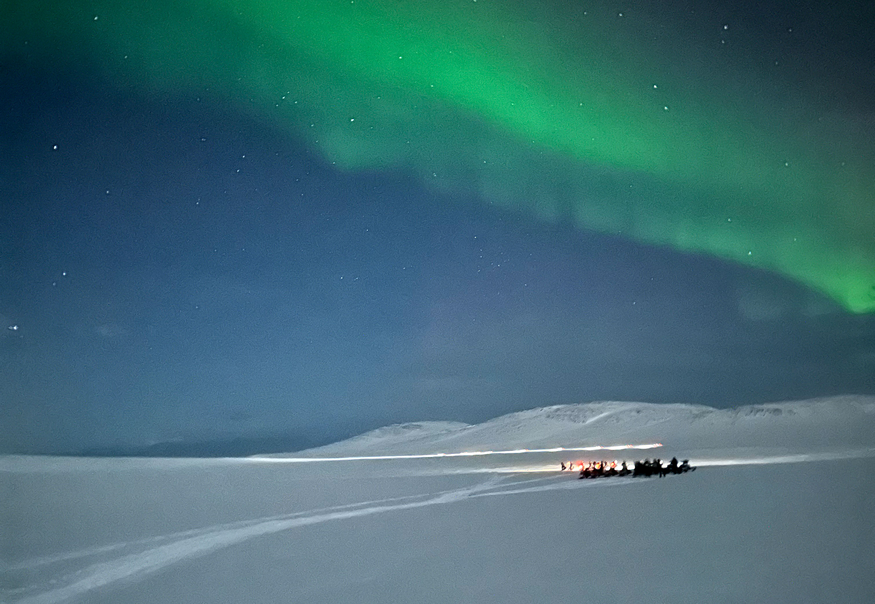 Arktis med snöskoter